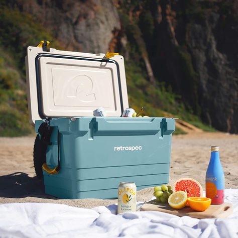 Take your outdoor adventures to the next level with the Retrospec Palisade Rotomolded Cooler! This fully insulated portable ice chest is perfect for beach trips, camping, and travel. Available in 25, 45, and 65qt sizes, it offers ample space. Built with durability in mind, it features a rugged rotomolded construction. The built-in bottle opener, tie-down slots, and dry goods basket add convenience. Keep your drinks and food chilled in style with the Retrospec Palisade Rotomolded Cooler! Redesign Ideas, 3d Scene, Reconnect With Nature, Outdoor Performance, Ice Chest, Around The Campfire, Family Camping Trip, Drinks And Food, Plastic Products