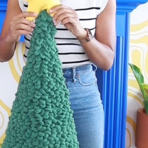 Amber Kemp-Gerstel on Instagram: "You know I can’t let the holiday season go by without a loopy yarn craft!! Last year we made a wreath…this year we’re going BIG! As in five foot loopy yarn Christmas tree big! And truthfully - it’s really easy to do! The hardest part is picking the color because @joann_stores has a ton of loopy yarn options! What color will your fluffy tree be? #joannpartner #handmadewithjoann" Loopy Yarn Christmas Tree, Loop Yarn Christmas Tree, Loopy Yarn Scarf, Loop Yarn Projects, Loop Yarn Christmas Wreath, Loops And Thread Cozy Blanket Yarn, Loop Yarn Winter Wreath, Yarn Christmas Tree, Christmas Tree Yarn