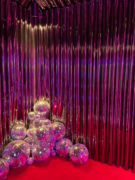 Art installation, disco balls, red, pink, parade, shiny, purple, New York City, soho, store, design Disco Ball Stage Design, Red Disco Party, Disco Ball Photo Backdrop, Ball Art Installation, Disco Color Palette, Disco Ball Ceiling, Disco Ball Installation, Disco Backdrop, Pink Disco Party