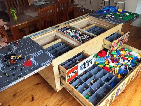 The folding-out table with many compartments opens up to so much storage space for Legos. The drawers also have organizers and dividers to sort out lego pieces. // Photo Credit: Instagram @ACCURIDEUS Lego Storage Table, Duplo Storage, Diy Lego Storage, Lego Play Table, Lego Room Ideas, Lego Desk, Lego Room Decor, Lego Table Diy, Lego Bedroom