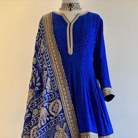 NIDHI TAMBI KEJRIWAL on Instagram: "Our Signature Raas Bandhej Dupatta in Gota and fine pearl work detailing with our bestseller Sharara kurta silhouette in the colour of the upcoming winter festive season: Royal Blue. For enquiries, orders and customisations, kindly connect with our teams over whatsapp at +91 8860558705 or +91 8591639131 or email us at info@nidhitambikejriwal.com" Kurta Silhouette, Bandhej Dupatta, Pearl Work, Colour Combinations Fashion, Colour Combinations, Diy Art Painting, The Colour, Festive Season, Diy Art