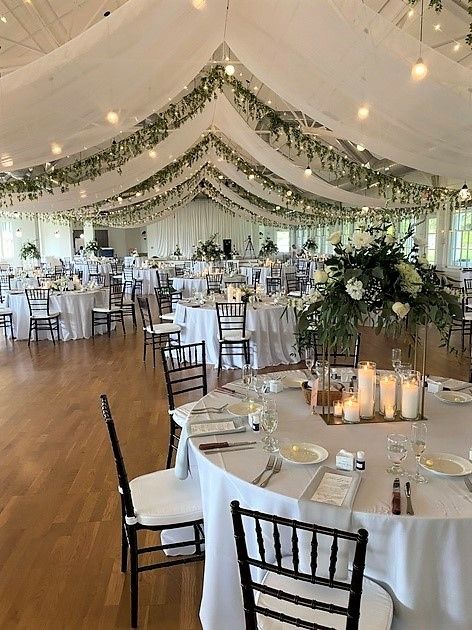 Ceiling draping with greenery for a wedding Window Draping Ideas, Ceiling And Wall Draping Wedding, Diy Draping Wedding Ceiling Decor, Wedding High Ceiling Decor, Wedding Reception In Gym, Decorating Gym For Wedding, Indoor Hall Wedding Decor, Ceiling Design For Wedding Reception, Venue Ceiling Decoration