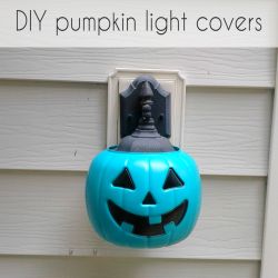 Love it!!  DIY pumpkin light covers.  Use those cheap pumpkin pails to make covers for your porch lights.  DIY halloween decor Diy Halloween Wall Sconces, Plastic Pumpkin Over Solar Lights, Pumpkin Bucket Solar Lights, Pumpkin Solar Lights, Plastic Pumpkin Light Cover, Halloween Porch Lights, Porch Light Covers, Diy Halloween Porch, Spool Projects