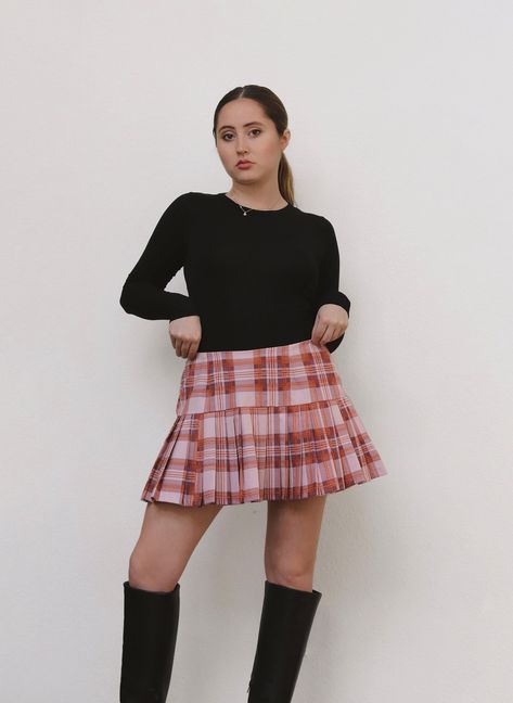 This Pink Plaid Mini Skirt is the perfect preppy piece to add to your wardrobe! Features an invisible zipper closure in the back. Looks great styled with knee high boots and a simple top. Sustainably made from vintage deadstock fabric. Model Measurements: Waist: 28 Hips: 34 Height: 5' 1 Pink Plaid Skirt Outfit, Mini Plaid Skirt, Pink Plaid Skirt, Plaid Skirt Outfit, Green Midi Skirt, Plaid Pleated Mini Skirt, Plaid Pleated Skirt, Simple Top, Purple Plaid