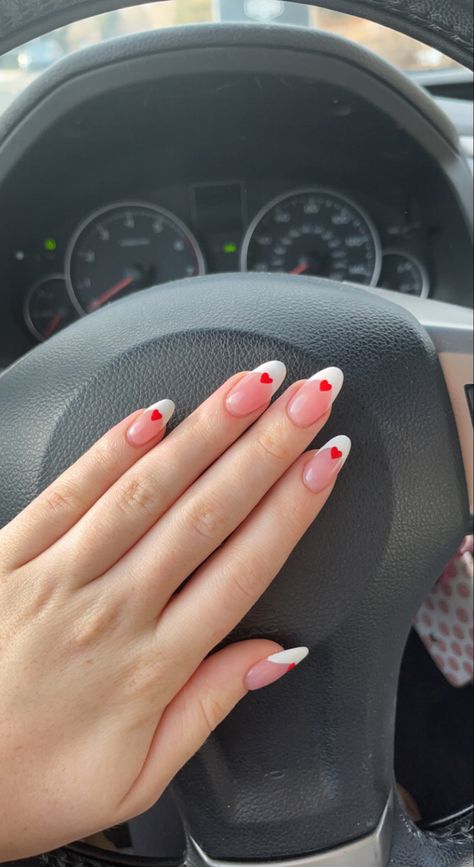 nail design picked by my boyfriend 🥰💋valentines nails february nails heart nails red nails french tip love nails galentines French Top With Heart, Valentines Nails Short French Tip, Heart French Tip, Valentines French Tip Nails, French Tip With Heart, Dance Nails, Soft Pink Nails, Wave Nails, Holiday Nails Winter