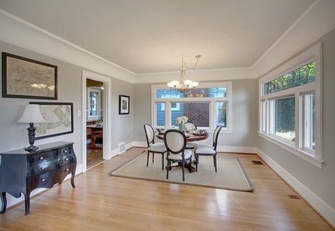 benjamin moore revere pewter with a slight green undertone as shown in this dining rooom with light oak floors. It's one of the best gray paint colours Revere Pewter Living Room, Craftsman Dining Room, Best Gray Paint, Best Gray Paint Color, Light Oak Floors, Grey Ceiling, Living Room Wood Floor, Living Colors, Traditional Dining Rooms