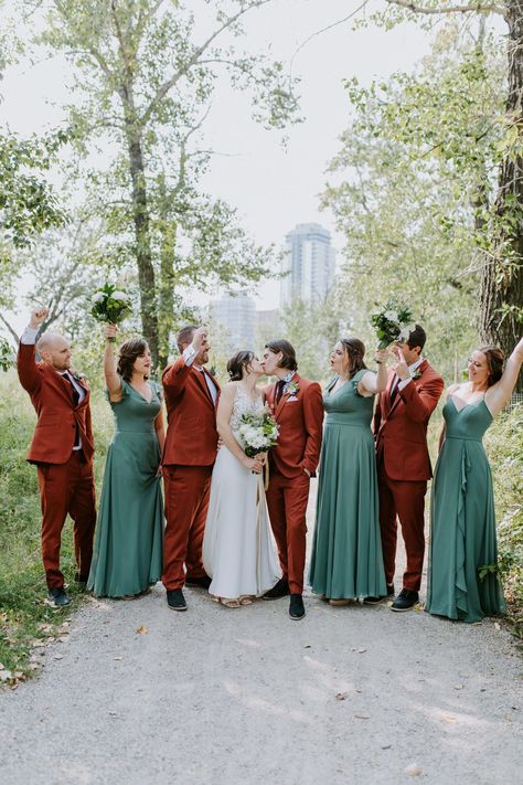 outdoor wedding party portraits, rust and terracotta suits and sage bridesmaids dresses for this fall wedding attire Terracotta Suit, Sage Bridesmaids, Rust And Terracotta, Fall Wedding Attire, Green Suit Men, Outdoor Wedding Party, Suit For Men Wedding, Costume Vert, Orange Bridesmaid