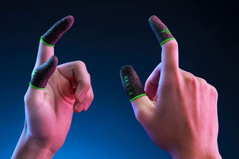 Razer made gamer thimbles - The Verge Razer Gaming, Finger Sleeve, Controller Design, Toasters, Make A Game, Gloves Design, Wireless Charging Pad, Gaming Clothes, Smartphone Case