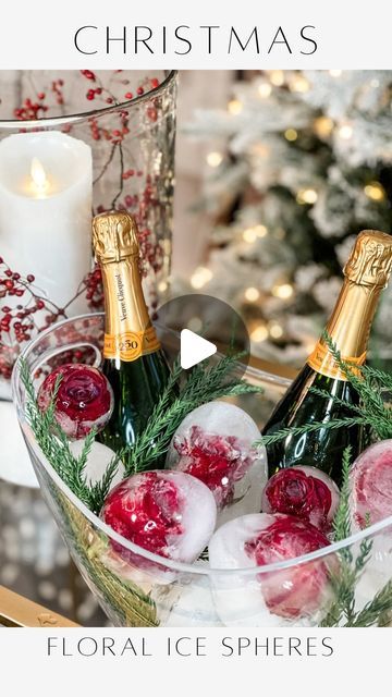 Janine Graff on Instagram: "Holiday Floral Ice Spheres ❄️I recreated my viral 65M floral ice spheres for the holiday season! Frozen rose ice spheres are a wonderful way to decorate and keep bottles cold for your Christmas and Winter gatherings.  Enhance your table setting or party decor with a touch of sophistication, a burst of color, and unique elegance that is sure to leave a lasting impression on your guests!  To make them, follow these simple steps:  1. Cut the stems off fresh roses, leaving only the flower heads. (Faux flowers work too) 2. Take a 12” balloon or ice mold and insert a rose head into it. (You will need two sets of hands or a tool)  3. Fill the balloon with water until it is the desired size. Make sure the rose head is fully submerged in the water. (Boiled water or disti Janine Graff, Frozen Balloons, Holiday Party Drinks, Christmas Tree Decorations Ribbon, Frozen Rose, Floral Ice, Boiled Water, Wine Candles, Burst Of Color