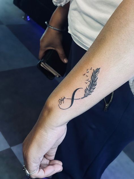 Tattoos For Daughters Name, Lost Love Tattoo, Mission Tattoo, Daughters Name Tattoo, Infinity Tattoo With Feather, Rare Tattoos, Names Tattoos For Men, Cool Wrist Tattoos, Remembrance Tattoos