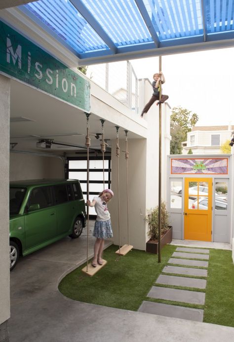 Green car, artificial turf, bluestone pavers, fireman pole, yellow door in Carport by Jeff King, San Francisco | Gardenista Carport Design, Modern Carport, Contemporary Garage, Bluestone Pavers, Glass Garage Door, Carport Designs, Side Yard, Home Construction, Outdoor Play