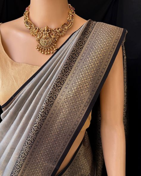 ₹ 1690/- Ash grey art silk saree with black zari border. Comes with contrast black pallu and blouse. Wash care: Normal wash. Find this saree in our website: Www.thejacouture.in> silk sarees> Ash grey art silk saree. Jewellery from: @anvi__jewellery #saree #artsilksarees #greysaree #sareelove #traditionalsaree #sareestyle #sareedraping #jewellery Silk Saree Jewellery, Grey Saree, Saree Jewellery, Art Silk Sarees, Grey Art, Traditional Sarees, Saree Styles, Ash Grey, Silk Saree