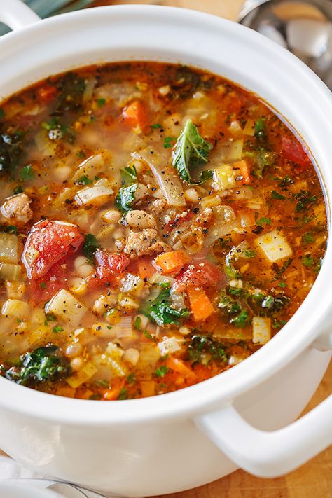 This Italian vegetable soup with spicy sausage is deliciously rich and brothy, made extra hearty with a spoonful of tender gnocchi! | thecozyapron.com #italianvegetablesoup #italianvegetablesouprecipe #italianvegetablesouprecipes #italianvegetablesouphealthy Italian Sausage And Gnocchi, Italian Vegetable Soup, Spicy Italian Sausage, White Bean Soup Recipes, Italian Sausage Recipes, Italian Vegetables, Sausage Soup, Spicy Sausage, Savory Soups