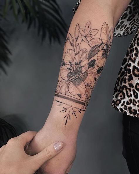 Tattoo Artist Germany on Instagram: "Lilies 🤍" Tiger Lily Wrist Tattoo, Lily Wrist Tattoo, Wrist Tattoo, Mandala Tattoo, Tiger Lily, Wrist Tattoos, Tattoo Artist, Tattoo Artists, Tattoo Ideas