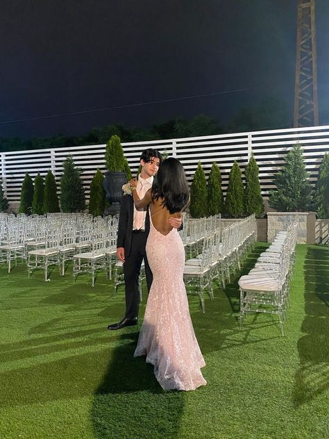 Prom Backless Dress, Baby Pink Dress Prom, Pink Prom Ideas Black Couples, Light Pink Prom Dress Aesthetic, Prom Couple Poses Black People, Pink Prom Dress And Date, Classy Prom Looks, Pink Prom Dresses Couple, Pink Dress Prom Couple