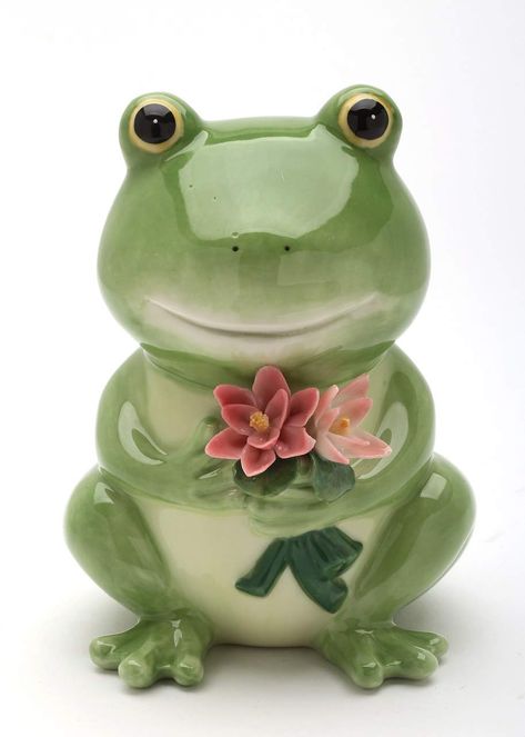 PRICES MAY VARY. Exquisitely detailed. Makes for a great gift or an excellent complement to your décor Great Porcelain Craftsmanship Colorful and Unique Design Hand Painted with Hand Formed Porcelain Flowers Detail Works Elegantly & Detail Sculpture Design Fine Porcelain Happy Green Frog Holding Pink Water Lily Flowers Money Piggy Bank Figurine, 5" H Whimsical Pottery, Ceramic Frogs, Money Jars, Holding Flowers, Green Frog, Spring Inspiration, Lily Flower, Girl With Hat, Fine Porcelain