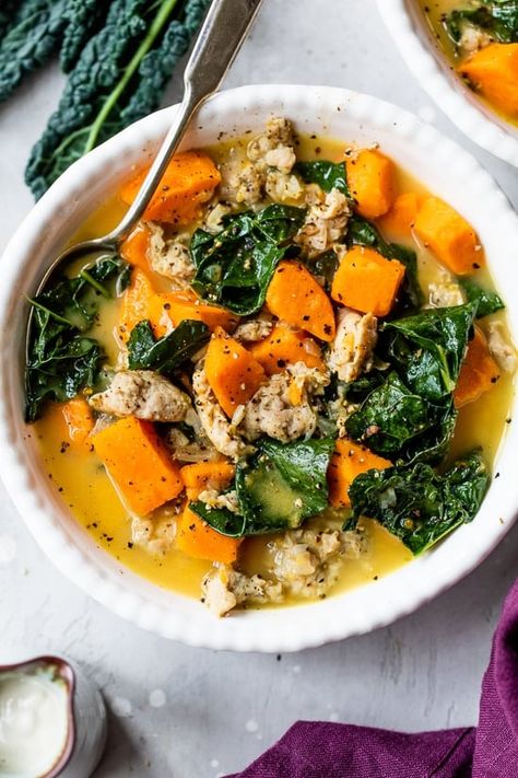 This Slow Cooker Creamy Sausage, Kale, and Sweet Potato Soup is a hearty, gluten-free, dairy-free soup you’ll want to add to your soup rotation! #soup #slowcooker #healthyrecipes #weightwatcherrecipes Sweet Potato Soup With Sausage, Soup With Sausage And Kale, Potato Soup With Sausage, Kale Sweet Potato Soup, Sausage Slow Cooker, Soup With Sausage, Sausage Potato Soup, Sausage And Kale Soup, Sausage And Kale