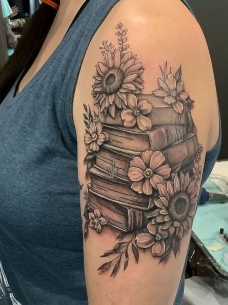 Floral Book Tattoo Floral Book Sleeve Tattoo, Plants And Books Tattoo, Book Stack With Flowers Tattoo, Books And Wildflowers Tattoo, Books With Flowers Tattoo, Owl Book Tattoo, Book Thigh Tattoo, Book Arm Sleeve Tattoo, Book Thigh Tattoos Women