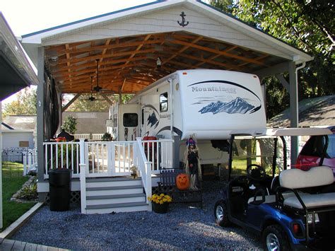 rv carports - Ecosia Camper Porch Ideas, Rv Shelter Ideas, Porch For Rv, Camper Porch, Porch For Camper, Rv Shelter, Trailer Deck, Rv Carports, Rv Lots