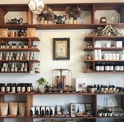 Apothecary Retail Design, Apothecary Merchandising, Tiny Shop Ideas Interiors, Round Table Merchandising Retail Displays, Modern Apothecary Design, Apothecary Design Interior, Herb Shop Interior, Apothecary Business Ideas, Holistic Shop Decor