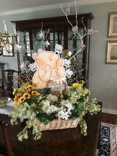 Foam core and faux greenery in a wicker basket makes an impressive centerpiece for a Pooh-themed shower.  (Purchased art download) Pooh Bebe, Winnie Poo, Fiesta Shower, Winnie The Pooh Themes, Winnie The Pooh Baby Shower, Baby Shower Theme Decorations, Winnie The Pooh Birthday, Classic Winnie The Pooh, Free Baby Shower