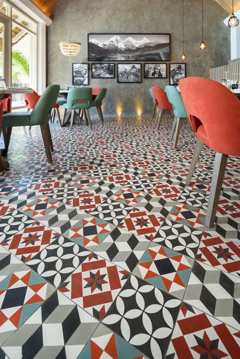 Unique Handmade Cement patchwork installed in this Peruvian Restaurant by Kelly Hoppen UK.  #Handmade #CementTiles Peruvian Tiles, Peruvian Restaurant, Kelly Hoppen, Grand Designs, Cement Tile, Cement, Contemporary Rug, Restaurant, Flooring