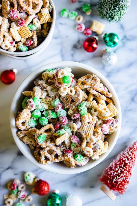 Make this delicious holiday Chex Mix with the perfect mix of sweet and salty ingredients. Red and green chocolates make it extra festive, and perfect for any holiday celebration. Also great for gift giving! Holiday Chex Mix Recipes, Christmas Chex Mix, Reindeer Chow Recipe, Chex Mix Ingredients, White Chocolate Chex Mix, Chocolate Chex Mix, Reindeer Chow, Erin Lives Whole, Chex Mix Christmas