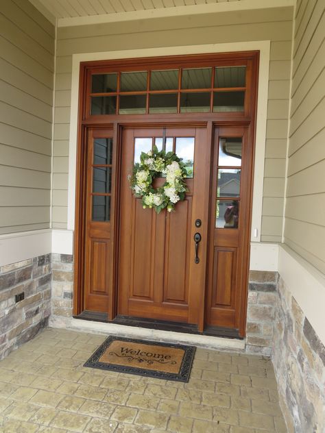 Craftsman entry door made by Adams Architectural Millwork Front Door With Columns Entrance, Stained Front Door With Transom, Double Front Door With Transom Above, Wooden Front Doors With Glass Panels, Craftsman Door Exterior, Craftsman Style Front Door, Craftsman Style Front Doors, Craftsman Exterior Door, Craftsman Front Door