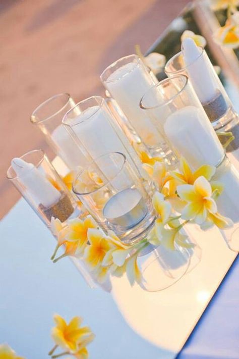 Tropical frangipani wedding decorations Fiori Frangipani, Frangipani Wedding, Fiji Wedding, Reception Centerpieces, Hawaiian Wedding, Wedding Table Decorations, Wedding Mood Board, Indian Wedding Decorations, Wedding Mood