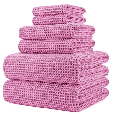 PRICES MAY VARY. Experience the super soft feeling of premium microfiber bath towels against your skin without the heft and bulk; unlike traditional towels you simply pat yourself dry not wipe Microfiber thoroughly dries faster and gentler than traditional fibers; waffle weave feels smoother on your skin and is less likely to collect lint or debris Face and Hand towels have loop for hanging, body towel has sewn in label; towels will quickly dry when hanging to help prevent the formation of odors Green Bath Towels, College House, Microfiber Bath Towels, Fluffy Towels, Dryer Balls, Cotton Bath Towels, Drying Towels, Pink Brand, Waffle Weave