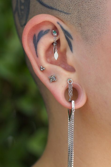 Chain designs are versatile accent pieces that can level up classy wardrobes or add a bit of edge to your everyday look.  ⁠ @bee.pierced AKA @beeynhu (both on IG) wears:⁠ — That Drip — Stretched Lobes⁠ — Starting at $275.00 — Vega | Tsavorite — Upper Lobe⁠ — Starting at $262.50 — Solstice & Solstice Charm — Rook — Starting at $237.50  All ethically hand crafted in North America using high quality materials approved by the Association of Professional Piercers. Septum Earrings, Piercing Bar, Classy Wardrobe, Upper Lobe, Pretty Ear Piercings, Stretched Lobes, Bar Jewelry, Body Piercing Jewelry, Chain Jewelry