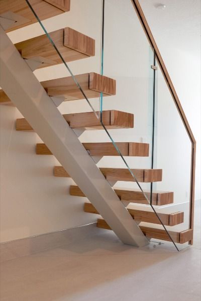 This project reminds us of the beach! The Sandstone Vedera FLIGHT Floating Stairs System features custom 4" hickory treads and a white powder-coated steel stringer. Bringing the staircase together is the elegant Vedera glass railing with a top cap handrail. Bespoke Staircases, Wood Handrail, Timber Staircase, House Staircase, Escalier Design, Steel Stairs, Wood Staircase, Glass Staircase, Stairs Design Modern