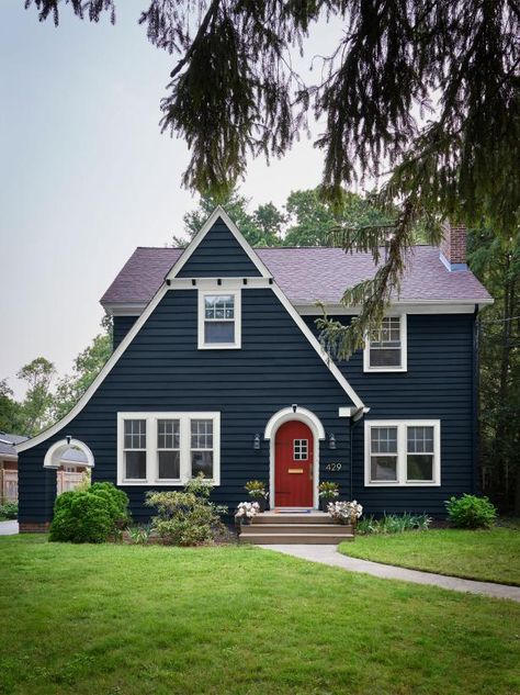 House External Colour Scheme, Navy Blue House Exterior, Blue House White Trim, Tudor Exterior, Navy Blue Houses, Brick Tudor, Tudor House Exterior, Red Door House, Blue Siding