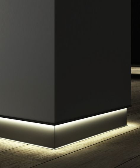 This aluminum toe-kick LED baseboard light by Alcon Lighting adds sophistication to modern commercial, residential and hospitality interiors. The baseboard strip light is installed to sit flush with the drywall's surface and has a frosted lens for even light distribution. The slim profile light strip can be cut to the desired shape in the field and is offered in a continuous run. Our baseboard lighting delivers 250 lumens per foot of power with a 120º beam spread with an optional remote dim Led Baseboard, Baseboard Lighting, Toe Kick Lighting, Baseboard Ideas, Hemp House, Nola House, Profile Light, Master Baths, Studio Floor