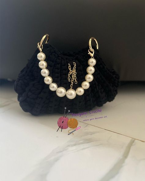 Pearl handles add extra beauty and accessorizing to any crochet bag, it takes a basic look to classy and elegant. They are available in different lengths, can be use for styles and as handles for mini bags Swipe to see different styling inspirations Price: 1500-2200 Send us a dm to order Location: ilorin Nationwide delivery #yarnstoreinilorin#pearlhandles#crochetbagsforgirls#ilorincrochet#yarnstoreinilorin Classy Crochet Bag, Pearl Crochet Bag, Luxury Chic Crochet Bag, Luxury Black Crochet Bag For Daily Use, Elegant Luxury Black Crochet Bag, Classy Crochet, Luxury Crochet Bag With Gold-tone Hardware, Classy And Elegant, Mini Bags