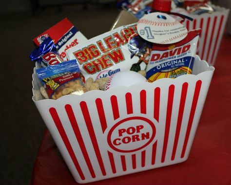 Baseball party favors- in dollar tree popcorn bucket 1 Small bottle coke 1 package of Microwave popcorn 1 box Cracker Jack  1 Baby Ruth 1 package of Big League Chew 1 package of planters peanuts 1 package of sunflower seeds 1 foam stress baseball Baseball Theme Birthday Party, Baby Shower Party Favors Boy, Baseball Party Favors, Baseball Buckets, Baseball Theme Birthday, Ruth 1, Big League Chew, Planters Peanuts, Baseball Theme Party