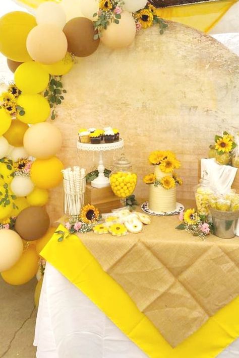 Take a look at this sunny sunflower baby shower! What a pretty dessert table!l! See more party ideas and share yours at CatchMyParty.com #catchmyparty #partyideas #sunflower #rusticparty #babyshower Sunflower Backdrop Ideas With Balloons, 18th Birthday Sunflower Theme, Sunflower 18th Birthday Party, Sunflower Fall Baby Shower Ideas Girl, Sunflower Themed Birthday Party Ideas, Sweet 16 Party Ideas Sunflowers, Fall Sunflower Birthday Party Ideas, Sunflower And Bee Birthday Party, Graduation Party Ideas Sunflowers