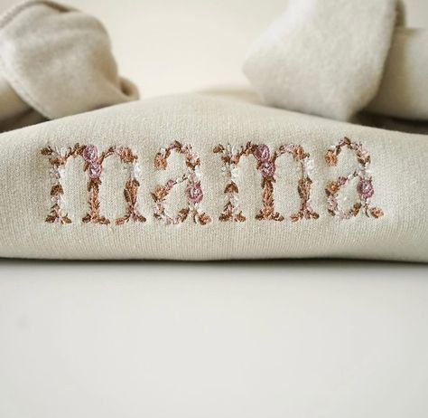 Our { Mama Floral 🌼 Embroidered Crew } is now live and available in sizes small - extra large. Come snag yours now and I promise it will be your new favorite casual fit 🤍✨ - - #mothersday #mama #mom #motherhood #mommyandme Mama Embroidery Sweatshirt, Hand Embroidered Sweatshirt, Mama Embroidered Sweatshirt, Bracelet Embroidery, Embroidery Crewneck, Mama Sweater, Embroidered Shirts, Embroidery Tshirt, Embroidery Sweater