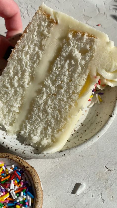 Tender, moist, and fluffy White Cake is a simple and elegant dessert for birthdays, gatherings, and holiday parties🎂 This classic recipe is made entirely from scratch and one that every home baker needs in their back pocket💖 #whitecake #cakerecipes #cakebaking #cakedecorating | Live Well Bake Often | PLÜM · To Stay Fluffy White Cake, Live Well Bake Often, Fresh Cake, Elegant Desserts, Birthday Desserts, White Cake, Classic Food, Living Well, Simple Weddings