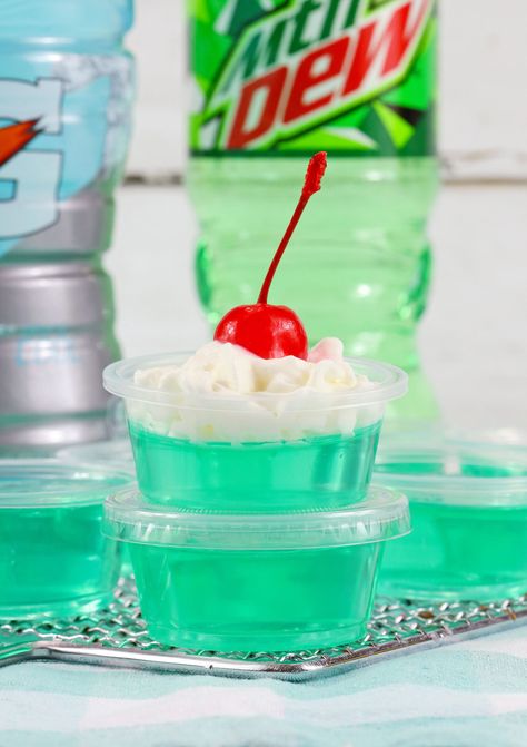 Mountain Dew Baja Blast Jello Shots Will Be A Huge Hit at Any Party Bahamas Mama Jello Shots, Mountain Dew Jello Shots, Baja Blast Jello Shots, Unique Jello Shots, Pickle Jello Shots, Strong Jello Shots Recipe, Fun Jello Shots, Mojito Jello Shots, Peach Jello Shots