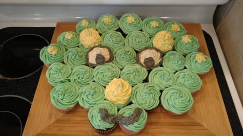 Green triceratops cupcake cake! Dinosaur Cupcake Cake, Dinosaur Cupcake, Dinosaur Cupcakes, Cupcake Birthday Cake, Dino Party, Dinosaur Birthday Party, Cupcake Cake, Dinosaur Party, 3rd Birthday Parties