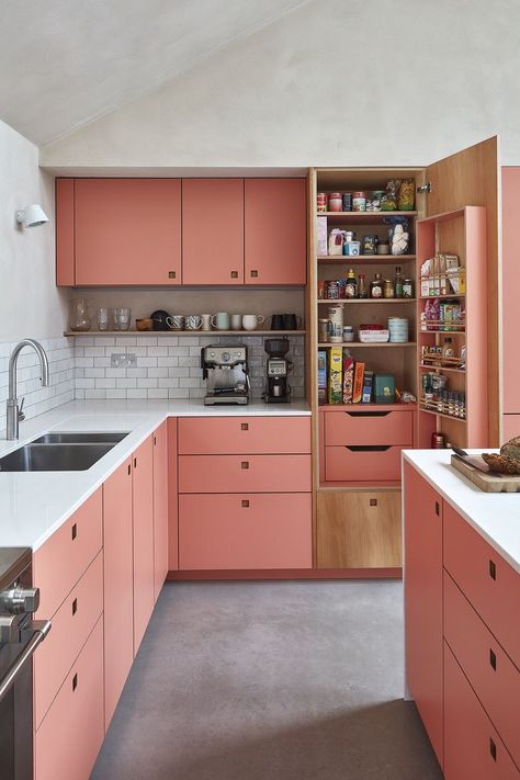 With a London Plane door, and colourful coral pink interior, this kitchen's larder cupboard is a home to all of the family favourites. Pink Kitchen Cabinets, Coral Kitchen, British Kitchen, Modern Kitchen Furniture, Kitchen Larder, Kitschy Kitchen, Family Kitchen, Pink Kitchen, Blue Kitchens