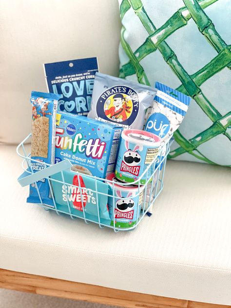 Easy Blue Easter Basket Idea ⤵️ If you’re still looking for last minute Easter Basket ideas that aren’t all candy - this aesthetically pleasing blue snack themed basket that I made for my husband came in just under $30 💙 This Easter basket would be great for a son, boyfriend, husband, teen, college student, neighbor or as a hostess gift or welcome basket for out of town guests ✨ Follow my shop @HousewifeHospitality on the @shop.LTK app to shop this post and get my exclusive app-only content! Boyfriend Easter Basket, Teen Boy Easter Basket, Cheap Easter Baskets, Blue Easter Basket, Teen Easter Basket, Blue Snacks, Adult Easter Baskets, Welcome Basket, Unique Easter Gifts