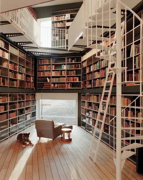 Now that's a cool idea. A floor-length window looking out on a gorgeous view in a library! This space is obviously meant to enjoy a book, and not to show off. Could use some comfy floor furnishings though :) Private Library, Dream Library, Library Room, Personal Library, Home Libraries, Library Design, House Goals, Dream Spaces, Style At Home