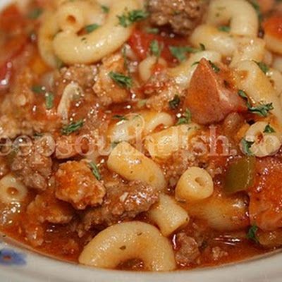 Southern Beef and Sausage Goulash Sausage Goulash, American Goulash, Deep South Dish, Pasta With Sausage, Goulash Recipes, Deep South, Andouille, The Trinity, Southern Cooking