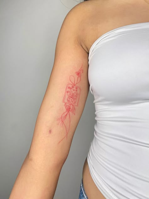 Upper Arm Women Tattoo, Fine Line Chinese Tattoo, Red Envelope Tattoo, Asian Arm Tattoo, Chinese Knot Tattoo, Japanese Charm Tattoo, Red Arm Tattoo, Red Fine Line Tattoo, Vietnamese Tattoo Ideas