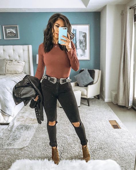 Yvetteg23 on Instagram: romper outfit casual style street style neutral outfit, plum purple mock neck bodysuit top, black high waisted jeans, double buckle belt, tank top casual style outfit brown tan taupe ankle booties outfit  #ootd #outfit #casual #casualstyle #fall #spring #summer #style #romper #freepeople Turtle Neck Bodysuit Outfit, Taupe Booties Outfit, Turtleneck Bodysuit Outfit, Tan Booties Outfit, Western Booties Outfit, Brown Bodysuit Outfit, Western Belts Outfit, Romper Outfit Casual, Fall Bodysuit Outfit