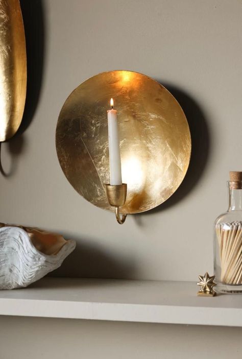 2 Lightingn up those gloomy winter nights with this gorgeous Brass Round Gold Leaf Candlestick Holder Wall Sconce. Whether you are a history lover or simply just adore the look of gold and candles, this wall sconce is sure to add an antique charm to your home. With a diameter of 20cm, this gold leaf beauty is sure to make a statement on your walls. ◾ size: Dia. 20cm / 7,8 ◾Product Info * Materials : 100 % Brass * Colour : Gold brass ◾SHIPPING Worldwide * The shipment arrival time is between 7 to Moroccan Wall Decor, Gloomy Winter, Metallic Decor, Twisted Candles, Deco Lighting, Moroccan Wall, Rockett St George, Wall Candles, Gold Walls