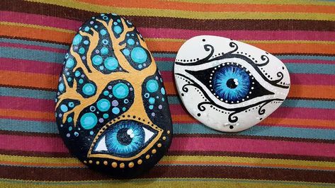 Hand-painted stones. Evil eye Evil Eye Painted Rocks, Evil Eye Rock Painting, Eye Rock Painting, Evil Eye Painting Ideas, Evil Eye Painting, Evil Eye Art, Mandala Rock Art, Evil Eye Design, Rock Painting Patterns