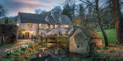 We Can't Decide If This 14th Century Cottage Is Magical, Charming or Both  - HouseBeautiful.com Bourton On The Water, Cotswolds Cottage, Stone Cottages, Quaint Cottage, Timeless Interiors, Cottage In The Woods, Thatched Cottage, Thatched Roof, English Cottage